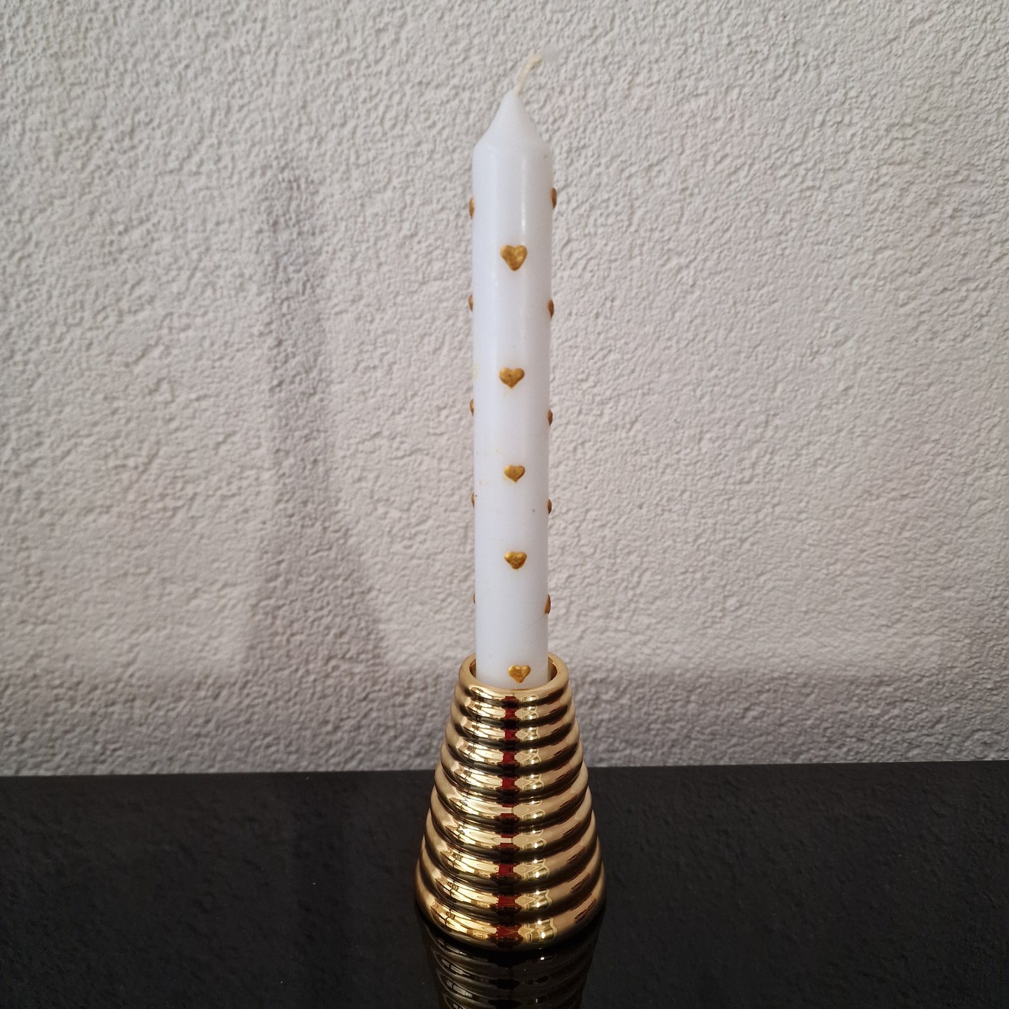 Gouden kandelaar Ringen