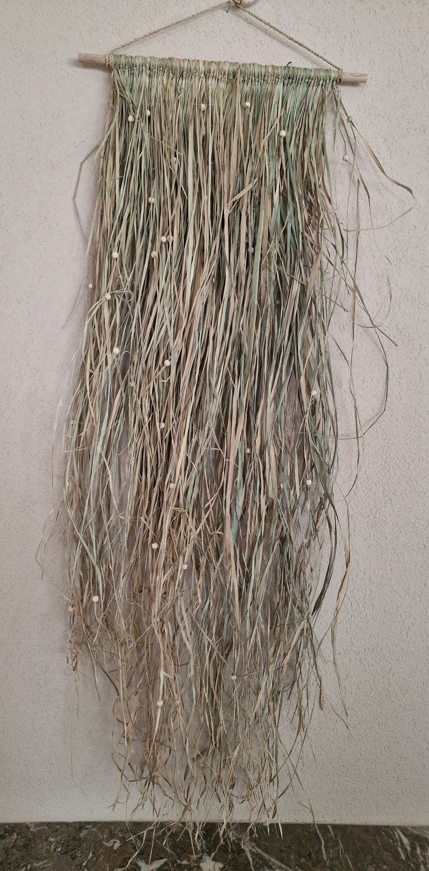 Hanger palmblad met kralen